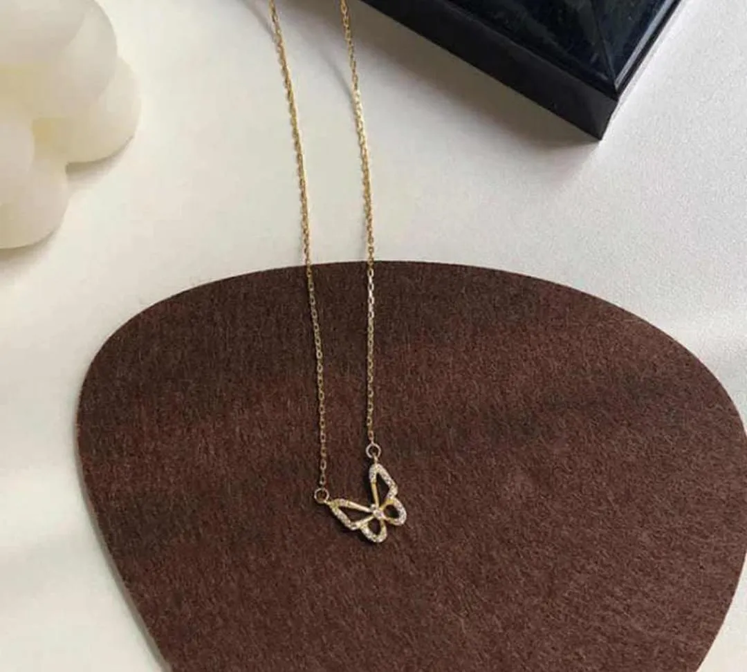 Butterfly Design Gold Plated Artificial Stones Pendant